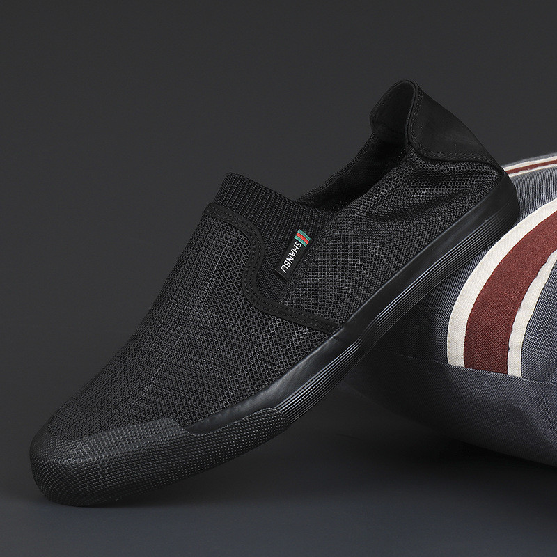2024. tavasz, új stílusú repülő hálós, légáteresztő férfi alkalmi cipők, puha talpú, univerzális, divatos férfi