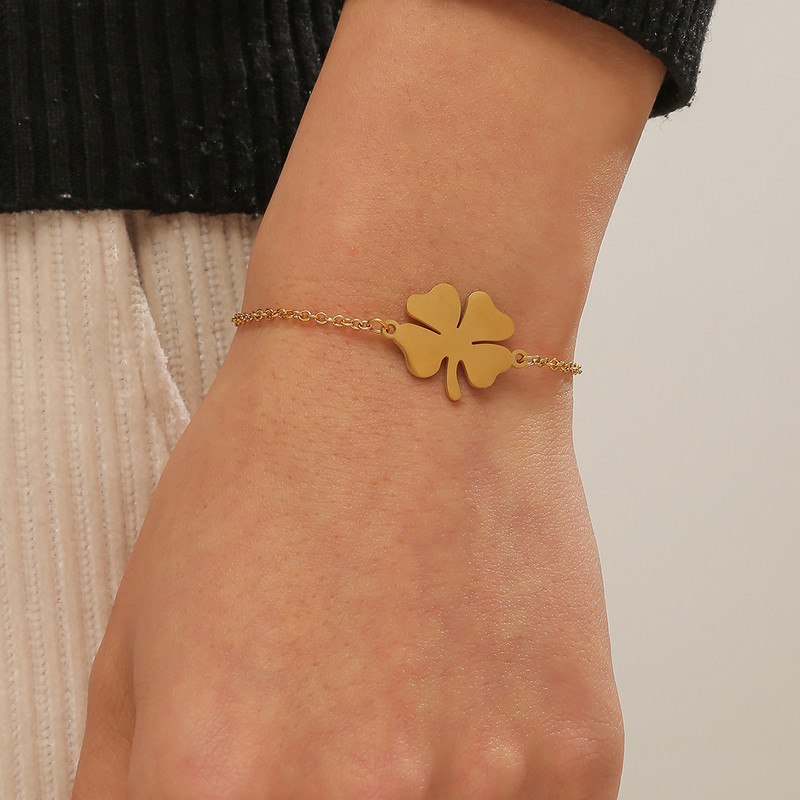 Euroopa ja Ameerika mood roostevabast terasest õnnelik neljaleheline ristik väikesed värsked lehed paar käevõru piiriülesed käteehted