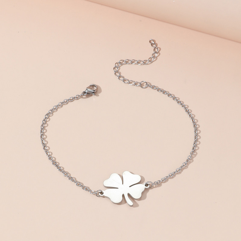 Euroopa ja Ameerika mood roostevabast terasest õnnelik neljaleheline ristik väikesed värsked lehed paar käevõru piiriülesed käteehted