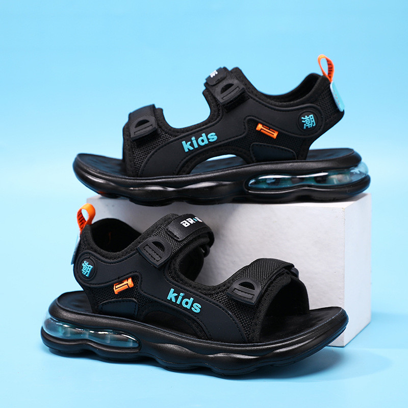 Poiste suvised rannajalatsid pehme talla ja õhkpadjaga 2024 uued keskmised ja suured laste takjapaelaga mustad laste suured sandaalid