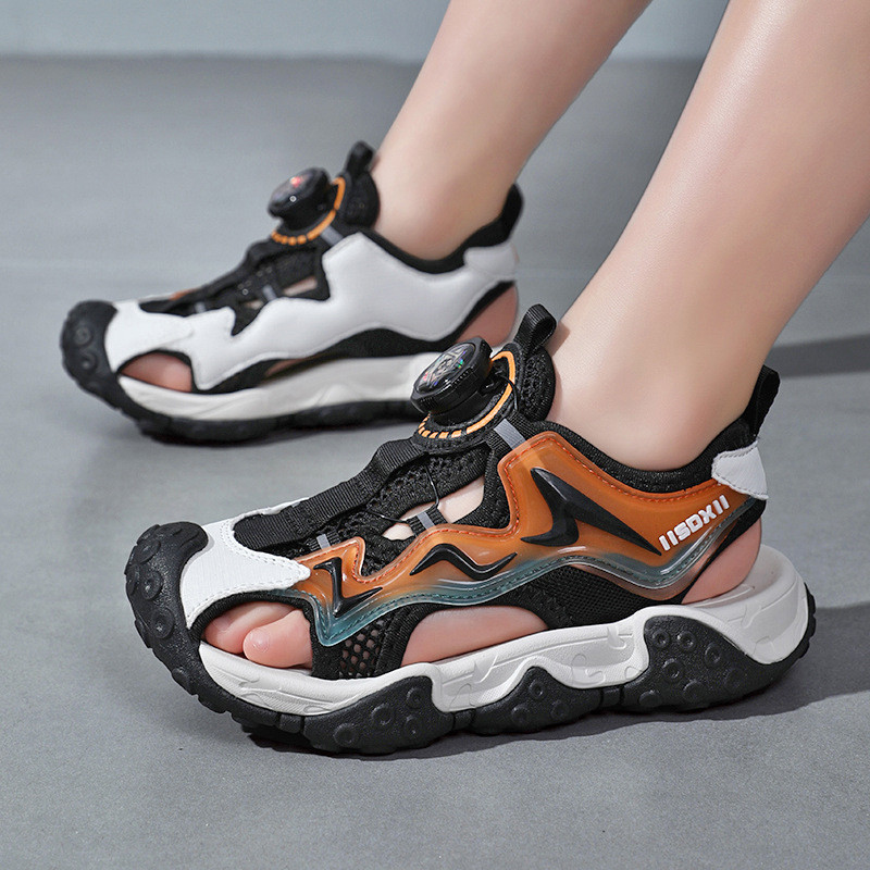 Baotou sandaalid 2023 suvel uus stiil poistele, tüdrukutele, keskmistele ja suurtele lastele, õõnes hingav pöörlev pannal, moodne laste 