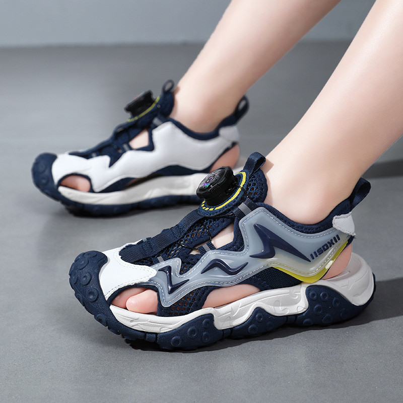 Baotou sandaalid 2023 suvel uus stiil poistele, tüdrukutele, keskmistele ja suurtele lastele, õõnes hingav pöörlev pannal, moodne laste 