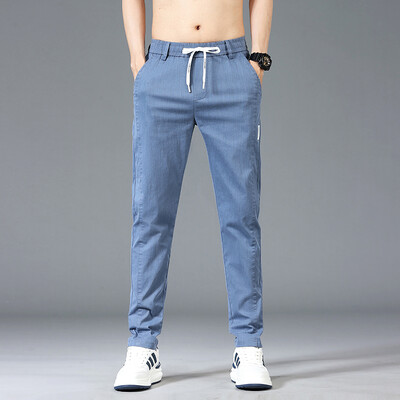 Mood Meeste Patchwork Print vabaaja püksid 6 värvi brändi elastsed õhukesed sirged püksid vöökoha keskosaga mugavad ühevärvilised püksid