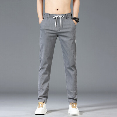 Mood Meeste Patchwork Print vabaaja püksid 6 värvi brändi elastsed õhukesed sirged püksid vöökoha keskosaga mugavad ühevärvilised püksid