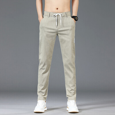 Mood Meeste Patchwork Print vabaaja püksid 6 värvi brändi elastsed õhukesed sirged püksid vöökoha keskosaga mugavad ühevärvilised püksid