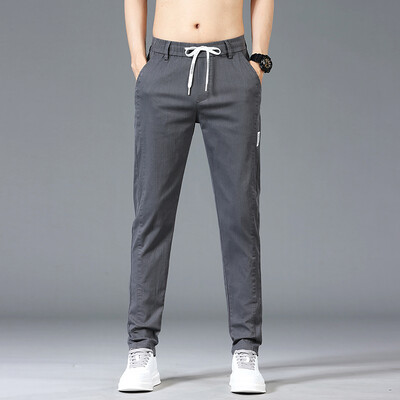 Mood Meeste Patchwork Print vabaaja püksid 6 värvi brändi elastsed õhukesed sirged püksid vöökoha keskosaga mugavad ühevärvilised püksid