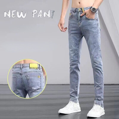 Nauji pavasario ir rudens mėlynai skalbti korėjietiškos mados laisvalaikio solidūs ploni kaubojiški džinsai paaugliams prabangūs kelnės aptempti vyriški džinsai