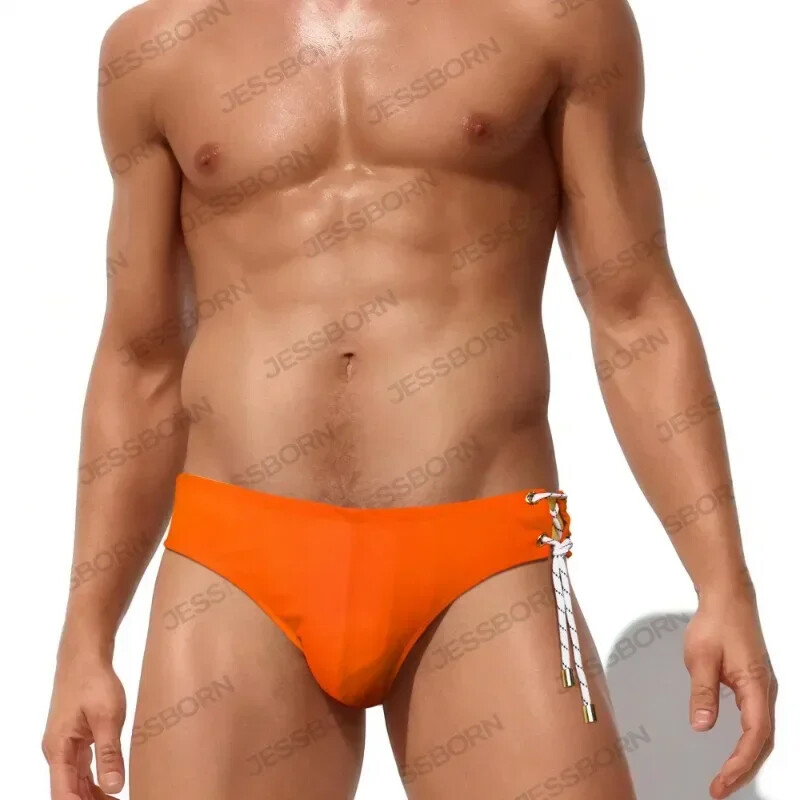 Meeste ujumispüksid madala kõrgusega bikiinidega ujumisriided Solid Quick Dry Swimsuit Sportlik surfikostüüm lukuga spordi ujumistrikooga