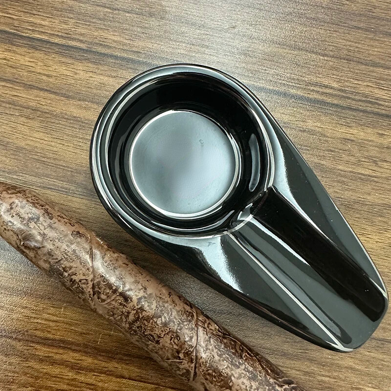 1 tk musta keraamika sigari tuhatoos, taskusse kinnitatav reisituhatoos