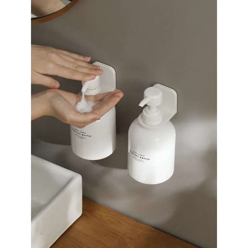 1/2 tk reguleeritav dosaatori pudelihoidja Seinale kinnitatav kleepuv šampoon Lotion käteseebipudeli riidepuu vannitoa hoiustamisriiul