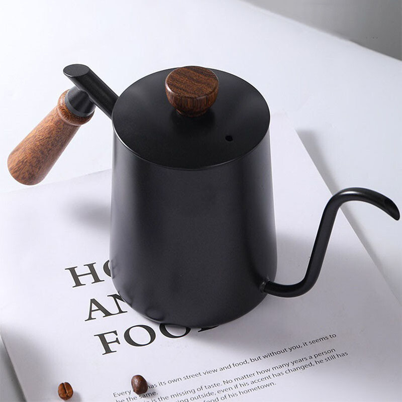 Roostevabast terasest tilgutiporti kohvikeetja temperatuuriga hanekelaga veekeetja matkakohvinõude ja teepuidust sangapotiga