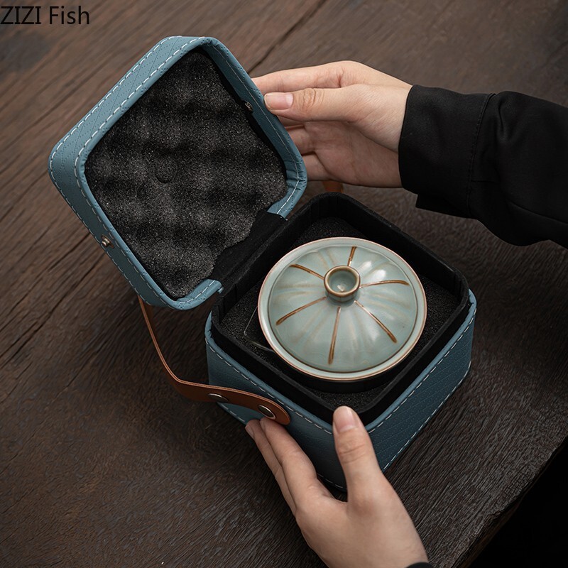 Lauko kelionių arbatos rinkinys Keraminis vieno puodo dviejų puodelių greito puodelio rinkinys Nešiojamas kiniškos arbatos ceremonijos Pu`er Tie Guanyin arbatos rinkinys draugui Dovana