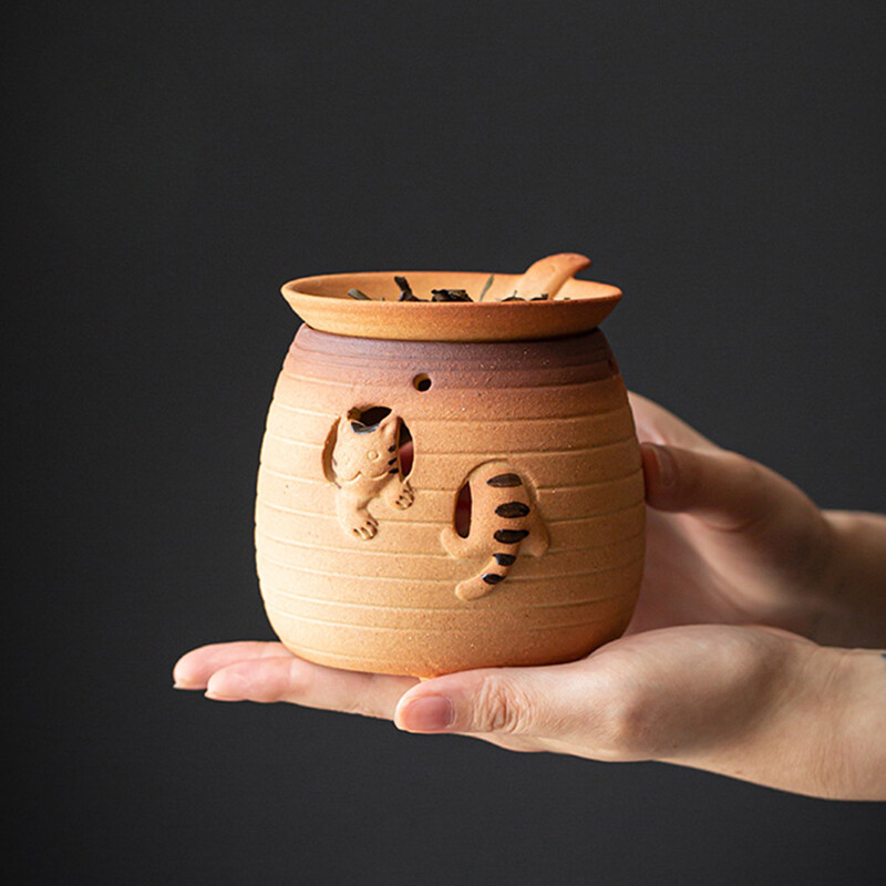 Kačiuko skrudinimas arbatos viryklė Keraminė kepimo krosnelė Maža buitinė aromato difuzorius Žvakė Akmens indai Kepti skrudinti apelsinai Samovar Baras