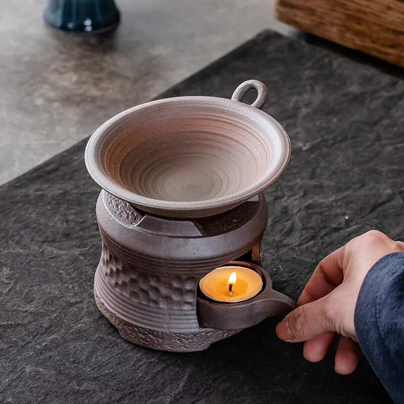 Žvakės šildantis arbatos skrudintuvas malkinis šildytuvas akmens masės keramikos arbatos viryklė Arbatinuko šildytuvas Šildymo izoliacijos pagrindas arbatos indas Virtuvė