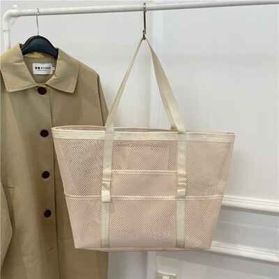 Nešiojamas tinklinis paplūdimio krepšys moterims makiažo kelionių laikymo skalbimo krepšys Vasaros kelionių plaukimo vonios krepšys organizatorius Pirkėjų krepšiai