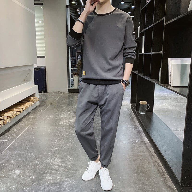 Uus kevadine ja sügisene pikkade varrukatega ülikond meeste T-särk Korea stiilis meeste spordi- ja vabaajarõivad dressipluusi ja dressipükste komplektiga, moekas