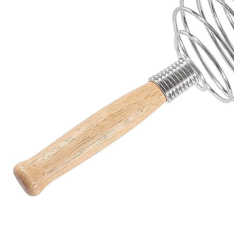 Разбиване на розово злато Пружинна бъркалка с топка от неръждаема стомана Спирална бъркалка с дървена дръжка Ръчен миксер за яйца Кухненски инструменти за печене