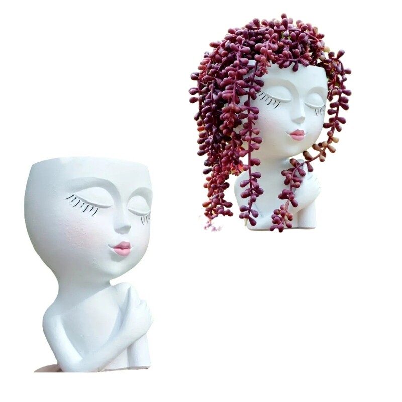 Tüdrukute skulptuuride istutusmasin potitaim kontori väikese taimeaia kaunistuseks