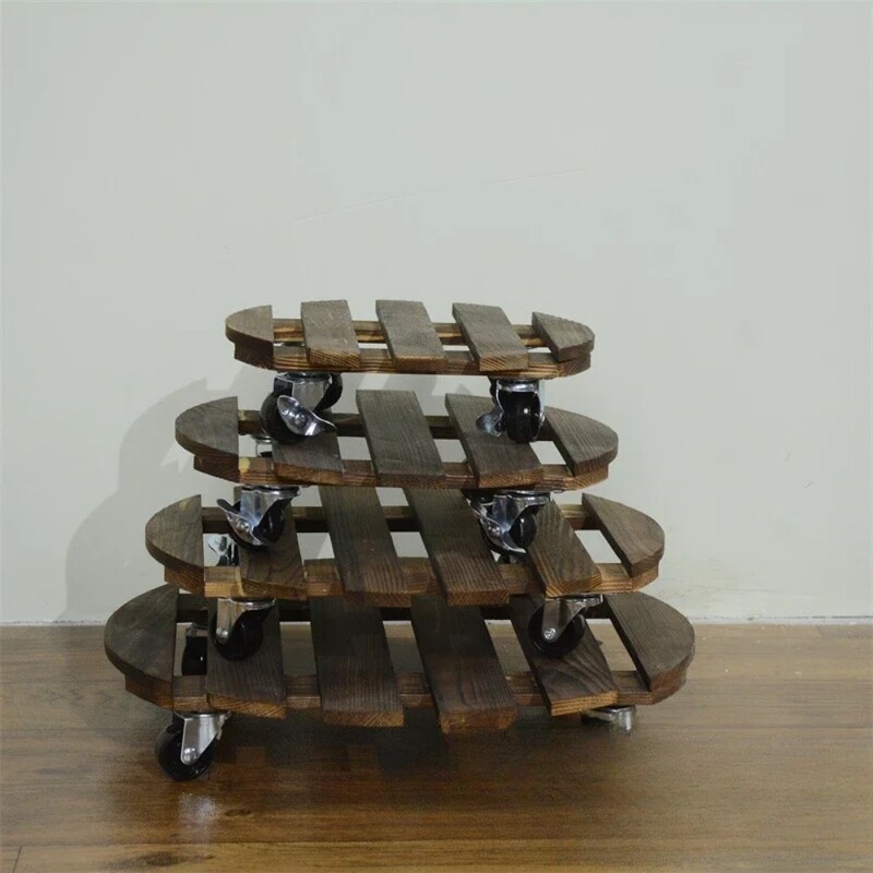 Tänu sellele tugevate rataste ja karboniseeritud puidust alusele potialusele saate oma potitaimed hõlpsalt teisaldada