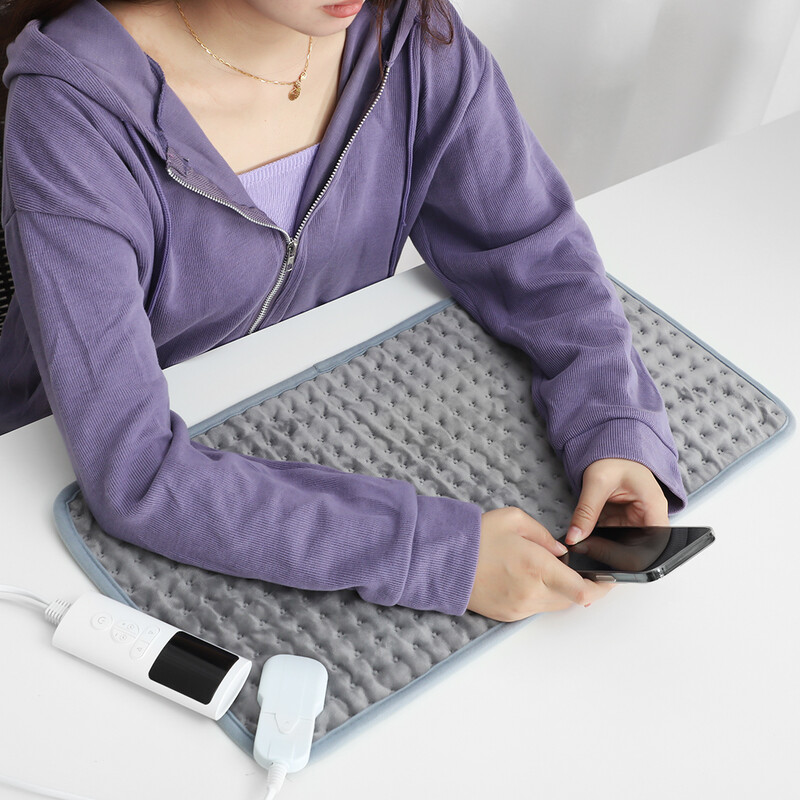 Elektriline soojenduspadi EL/Ühendkuningriik/USA pistikuga füsioteraapia soojendustekk kõhu vöökoha seljavalu leevendamiseks talvine jalgade käte soojendaja