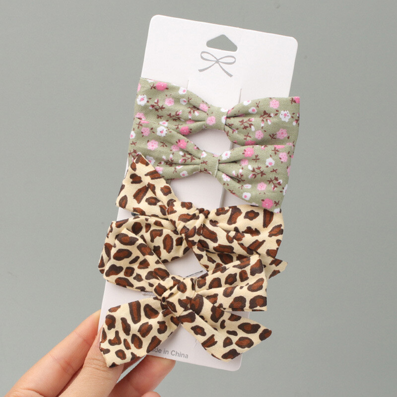 Euroopa ja Ameerika trükitud populaarne lastekangas lillelise kaarjuuksenõelaga, armsad väikese tüdruku küljeklambrid neli ühes kaardis