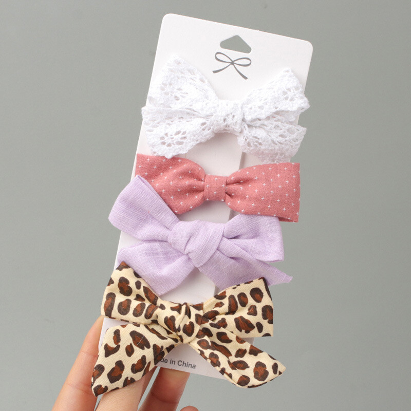 Euroopa ja Ameerika trükitud populaarne lastekangas lillelise kaarjuuksenõelaga, armsad väikese tüdruku küljeklambrid neli ühes kaardis