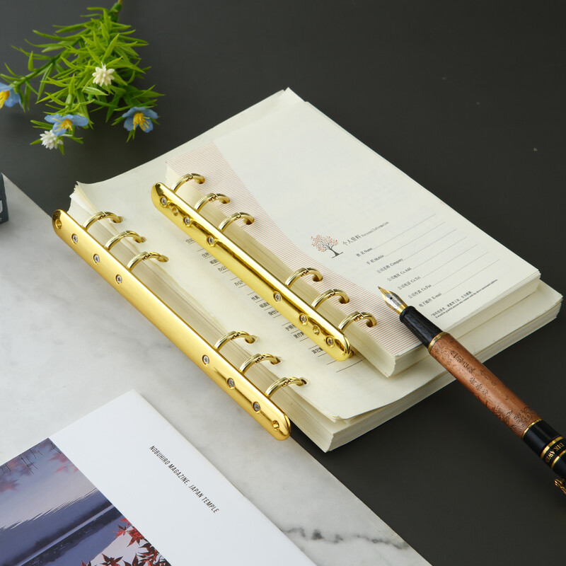 A5 A6 Kuldne rõngasköitmisklambrid Eemaldatav pannal lahtiste lehtedega köitmisriba Värvilised metallist köitmisklambrid Kontoritarbed