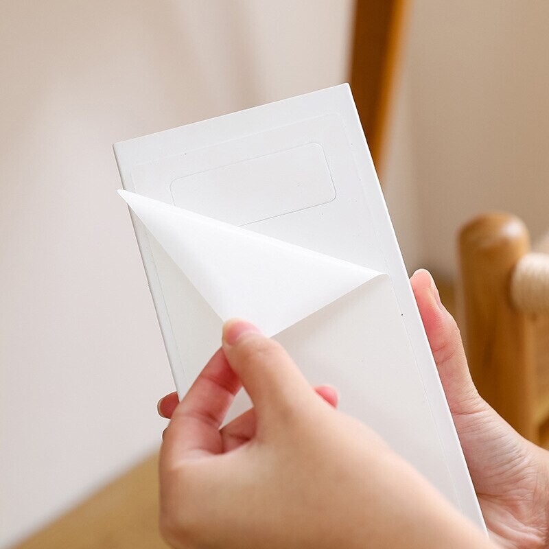 Peidetud laud pasta all plastikust lauasahtel jagaja kirjatarvete organiseerija memopliiats kirjatarvete hoiukarp ümbris kirjutuslaud kleepuv sisekujundus