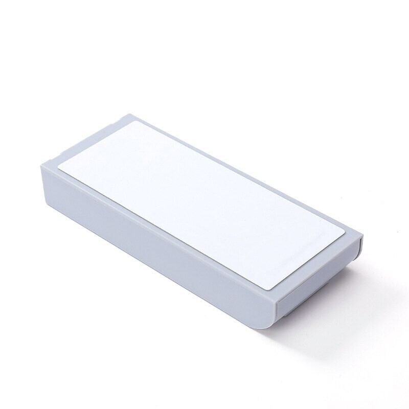 Peidetud laud pasta all plastikust lauasahtel jagaja kirjatarvete organiseerija memopliiats kirjatarvete hoiukarp ümbris kirjutuslaud kleepuv sisekujundus