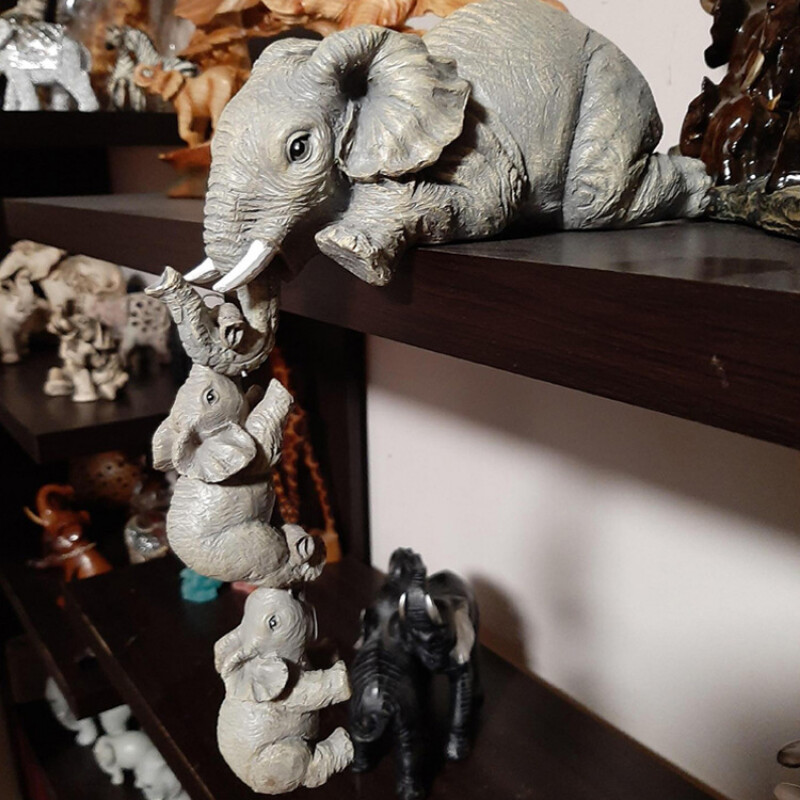 Kolm elevanti Ema ja laps Vaigust aianduskaunistused Elevandi rippuvad käsitööd Kunstiteosed välihoovis skulptuur