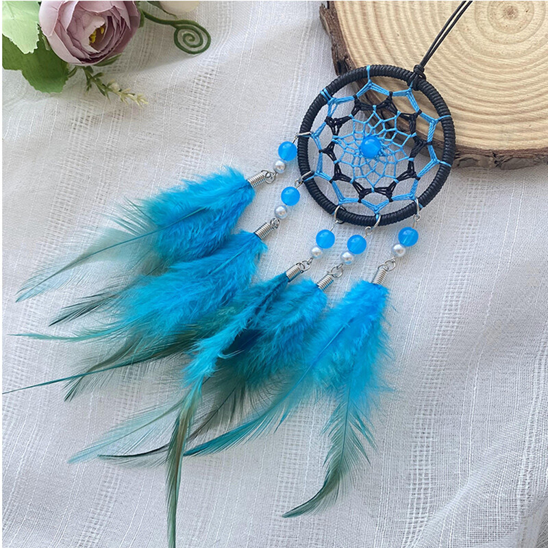 Unenäopüüdja Käsitsi kootud sulgedest tuulekell Loov autoripats Magamistoa seinaripp Festival Peokink Kodukaunistused