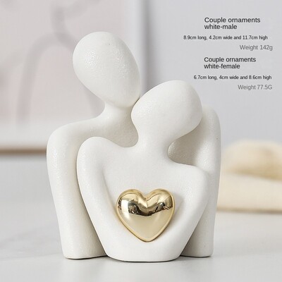 Südamekujuline kullatud abstraktne lihtsate tegelaskujudega kaunistus Veinikapp Esik Paar kallistus Kunstkaunistus keraamiline käsitöö