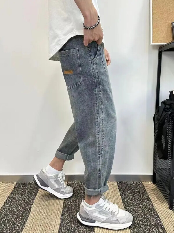 Meeste teksad Kärbitud Mees Kauboi Püksid Helesinised Püksid Harem Disainer Cotton Baggy Plus Size Tavaline Korea Mood Pehme Lahti