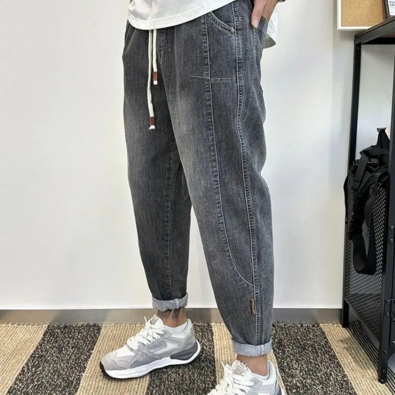 Meeste teksad Kärbitud Mees Kauboi Püksid Helesinised Püksid Harem Disainer Cotton Baggy Plus Size Tavaline Korea Mood Pehme Lahti