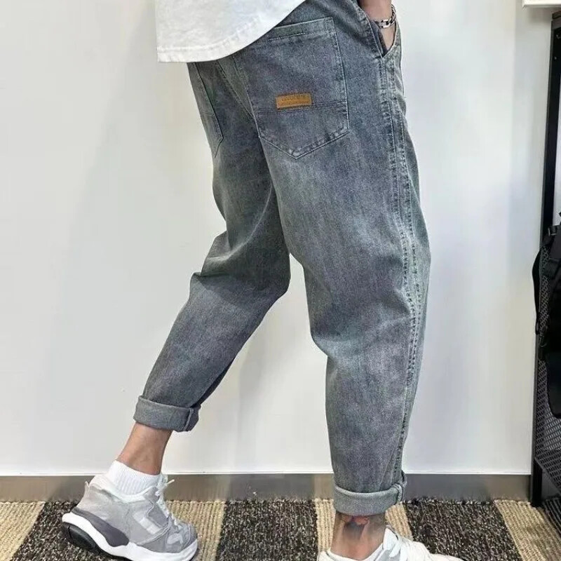 Meeste teksad Kärbitud Mees Kauboi Püksid Helesinised Püksid Harem Disainer Cotton Baggy Plus Size Tavaline Korea Mood Pehme Lahti