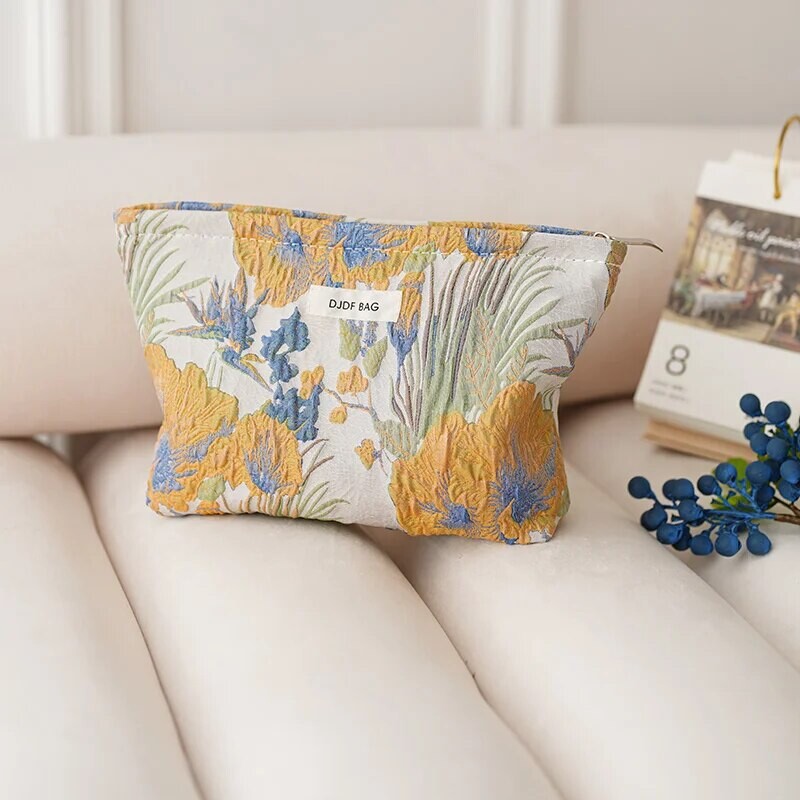 Naiste meigikott, värviline lilleline lõuend, suure mahutavusega huulepulk õhkpadjaga hoiukott.