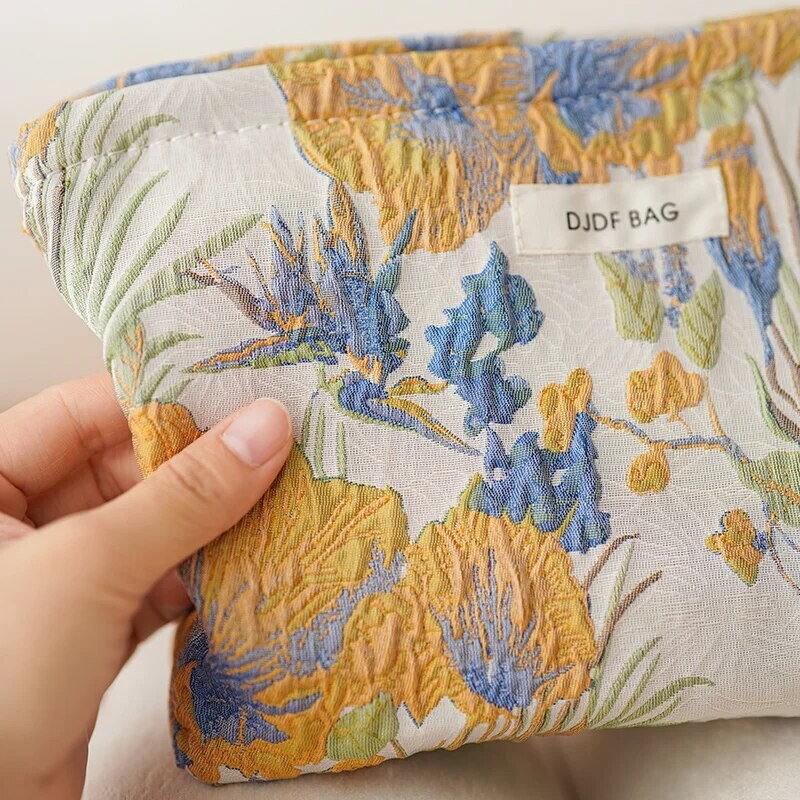 Naiste meigikott, värviline lilleline lõuend, suure mahutavusega huulepulk õhkpadjaga hoiukott.