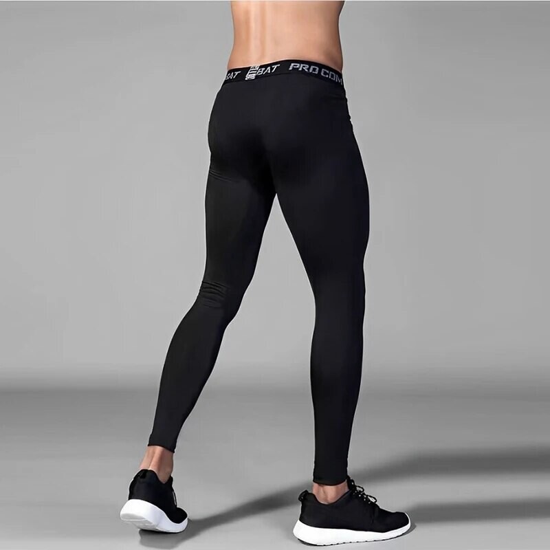 Vīriešu jaunas sviedrus absorbējošas, elpojošas, ātri žūstošas elastīgas, šauras sporta apakšpuses Basketbola fitnesa ērtas bikses