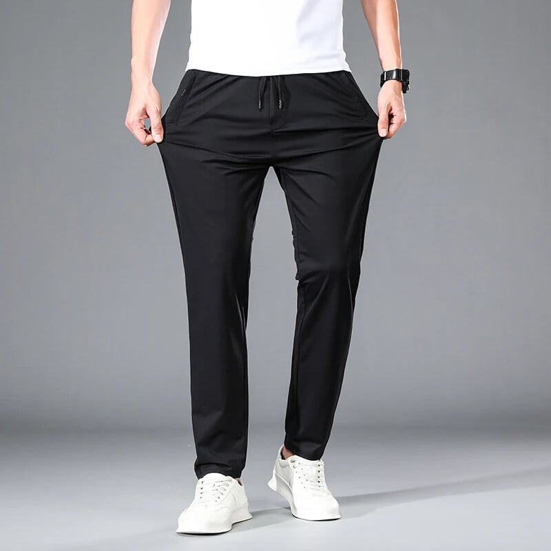 Kevadsuvi tikandid Meeste õhukesed sirged õhukesed püksid elastne vöökoht Mood vabaaja laia säärega püksid Meeste jooksupüksid