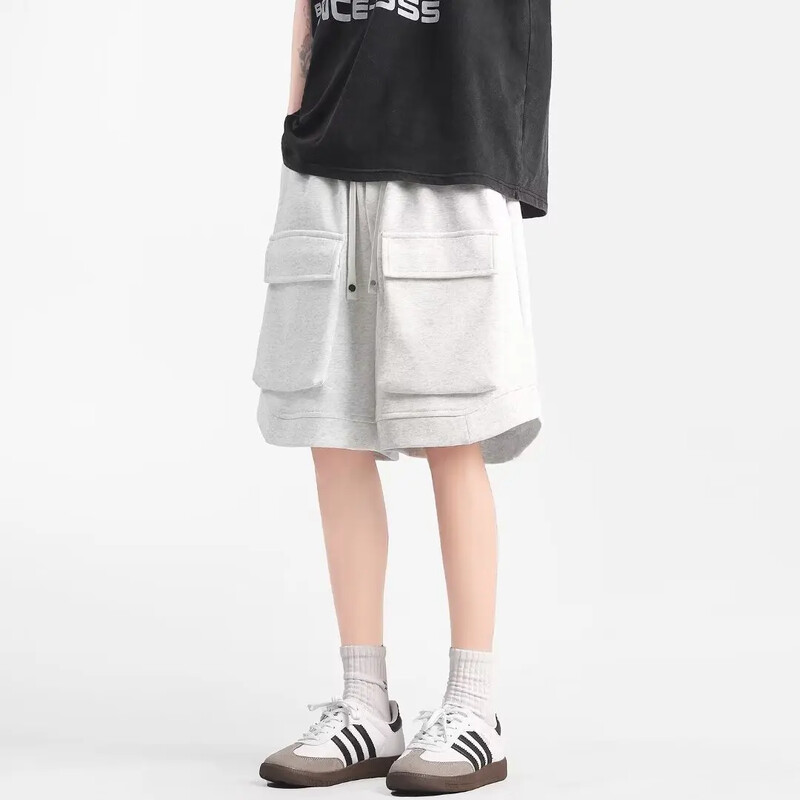 Suvised uued meesterõivad kärbitud kandepüksid, vabad vabaaja spordipüksid keskmise vöökohaga noorte üliõpilaspüksid