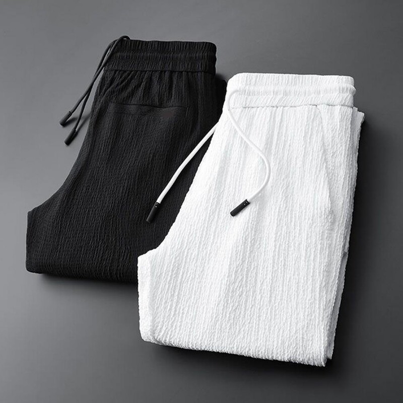 Triibulised plisseeritud meeste bleiserid Ülikonna nööriga püksid Meeste komplektid lahtised revääritaskud Õhukesed ametlikud bleiserite komplektid rõivad