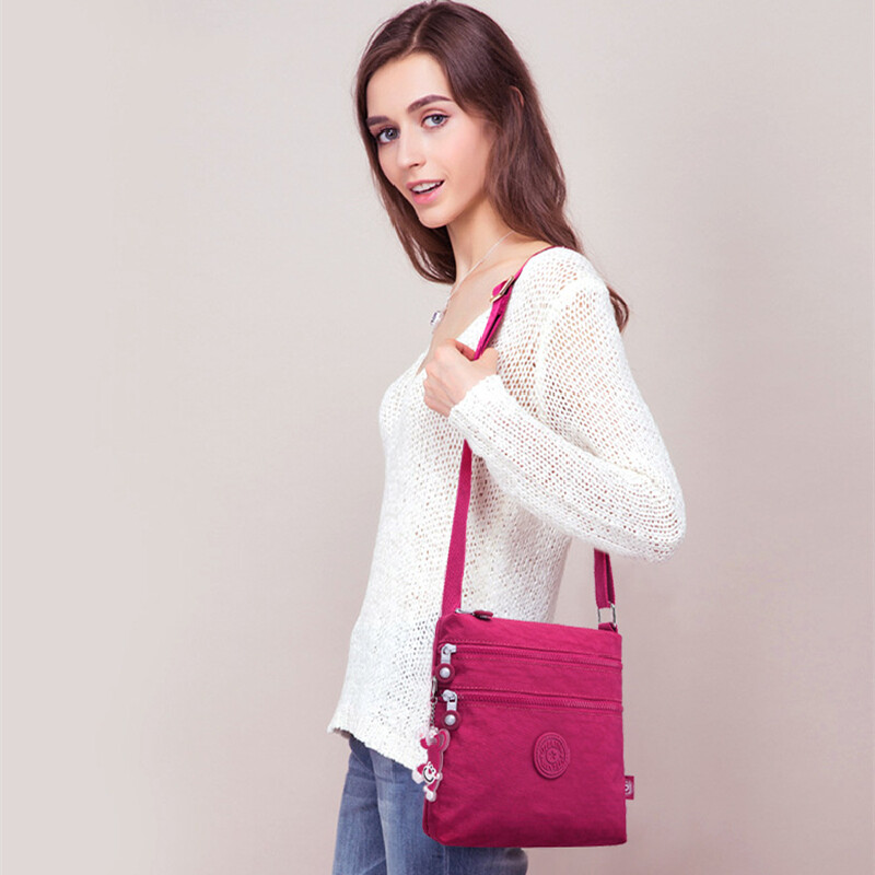 Kvaliteetne mood meeste naiste õlakott Väike risti korpusega telefonikott Helesinine hall Must punane lilla M0910