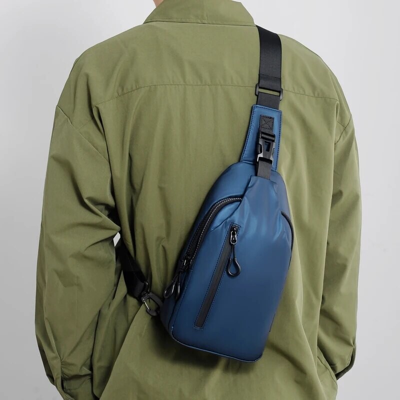 Suure mahutavusega laste ja meeste USB-laadimise multifunktsionaalne rinnakott on lihtne ja kerge ühe õlakottiga