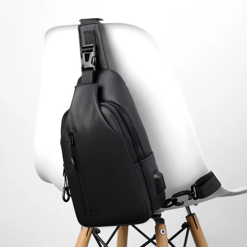 Suure mahutavusega laste ja meeste USB-laadimise multifunktsionaalne rinnakott on lihtne ja kerge ühe õlakottiga