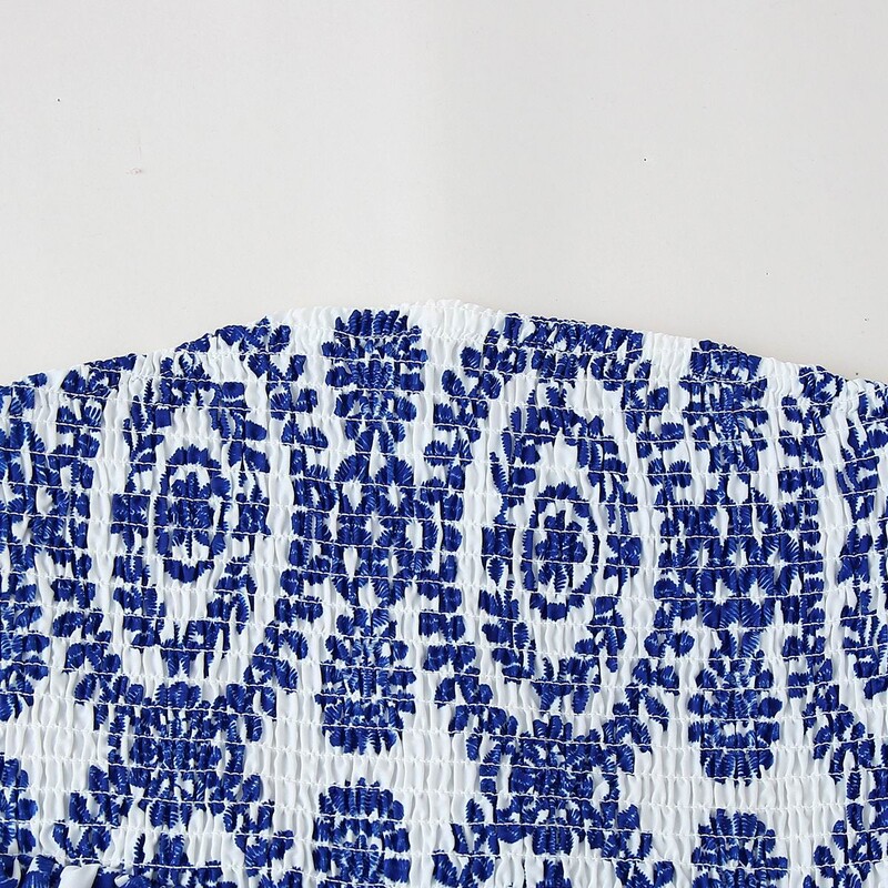 Trükitud lillelised kärbitud ülaosaga, rihveldatud rinnakorviga, õlakateta, volangiga põhjaga naiste suverõivad