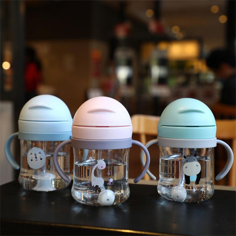 Hordozható mini baba csésze vállal Kényelmes Kawaii iskolai szalmakupa tejesüveg etetőpalack gyerekeknek gyerekeknek