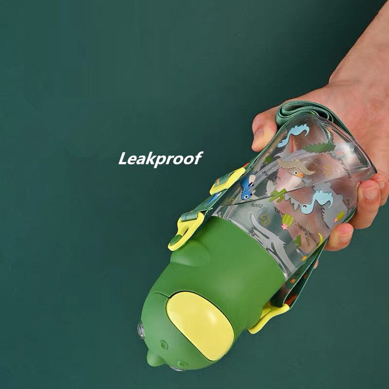 560 ml karbist dinosauruse õlgedest veepudel lastele koos rihmadega Tritan Bpa, purunemiskindel Kawaii lapsekõrvits kooli jaoks