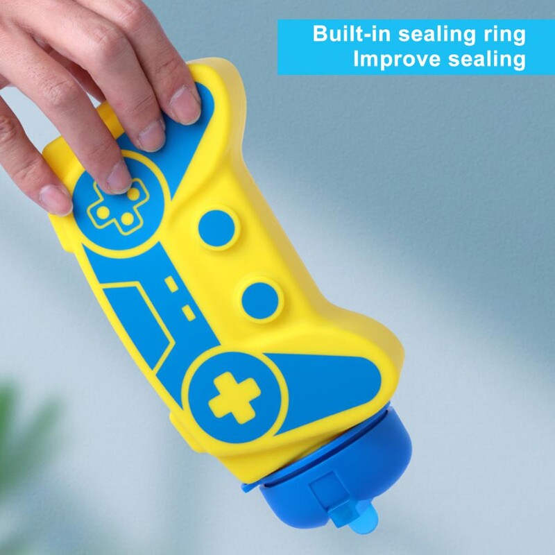 600 ml spordipudel kokkupandav mängukonsooli kujuga reisikooli lastele õpilaste veepudel randmepaelaga silikoonist veepudel