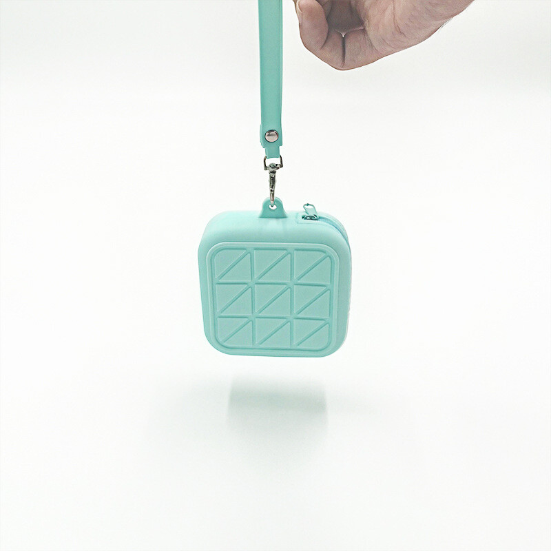 Kommivärvi silikoonist ruudukujuline mündikott kõrvaklappide hoiukott Naiste kaasaskantav huulepulk kosmeetikakott Üliõpilaste lihtne väike esemekott