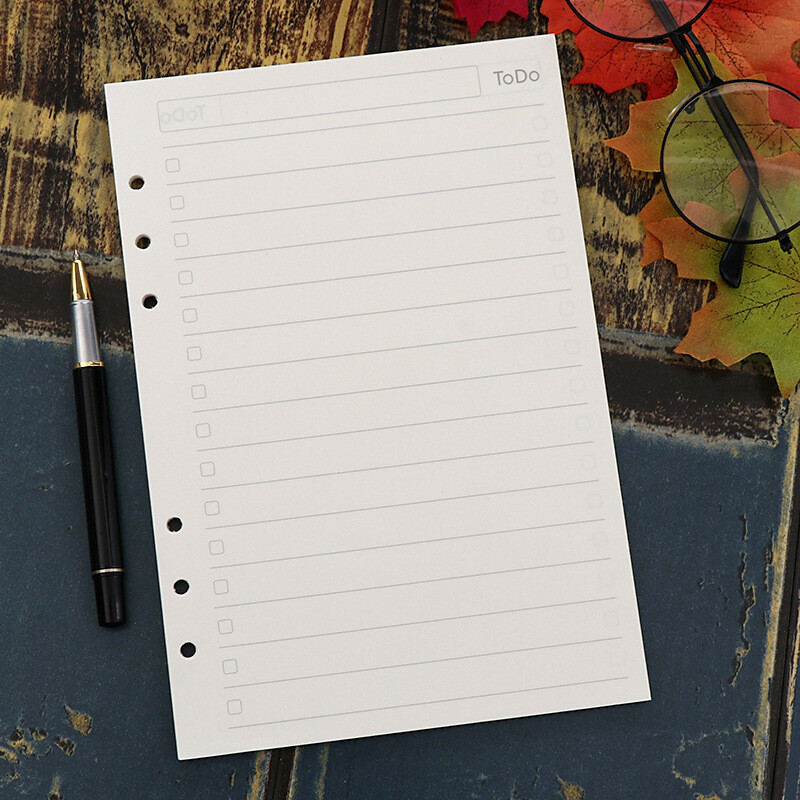 A5 lahtiste lehtedega märkmiku täidis spiraalköitja siselehe päevik Iganädalane igakuine tegevuste loend Joone punktide ruudustik paberi sees